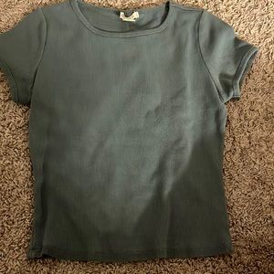 green fitted top slight crop